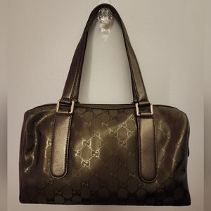 Authenticated rare vintage Gucci speedy bag in metallic olive green